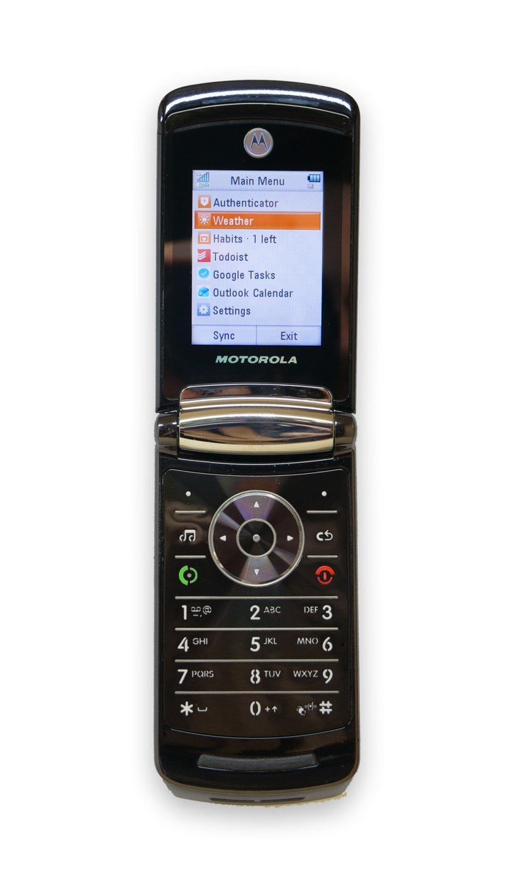 Motorola RAZR2 V8 flip phone showing the RetroRelay main menu